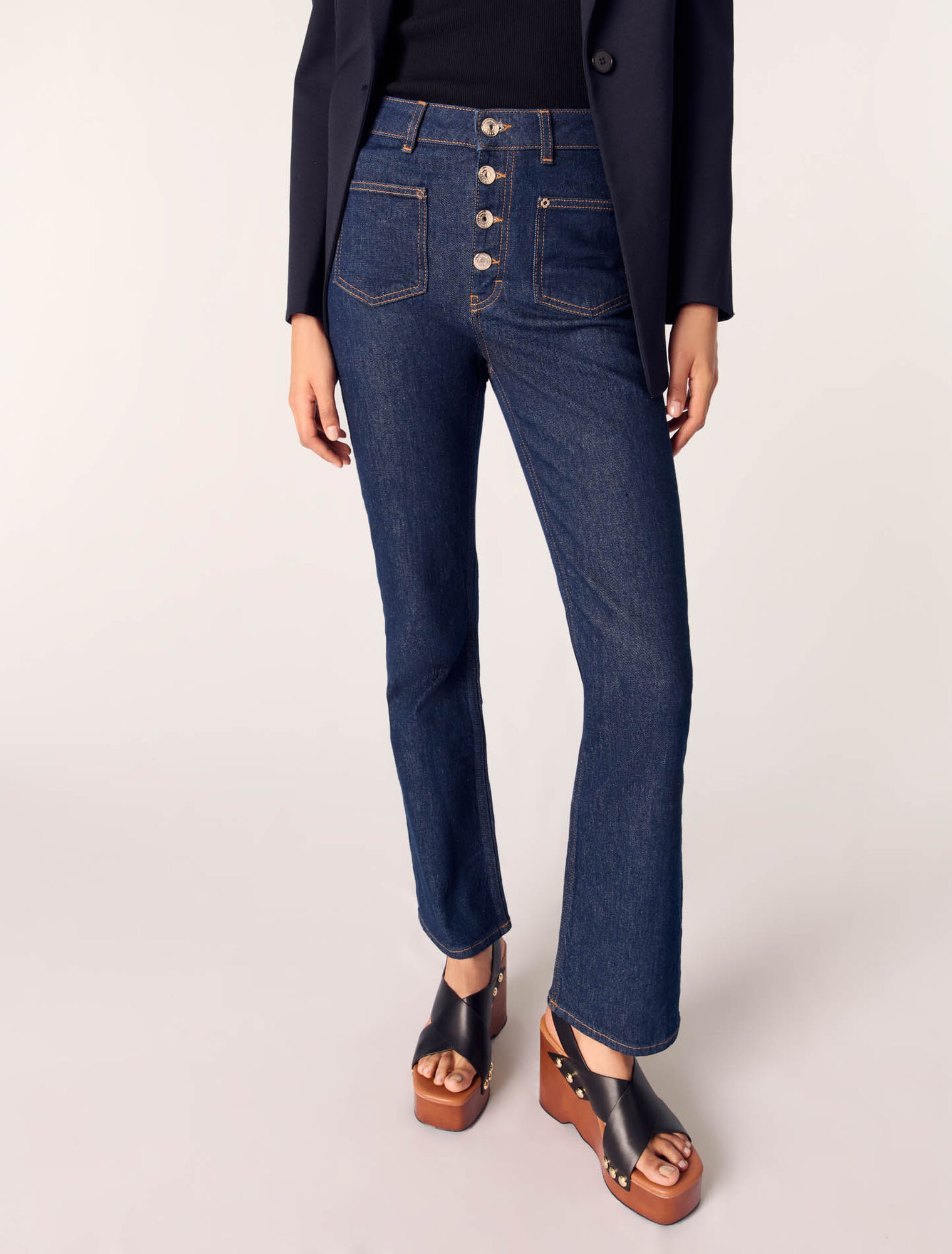Jeans in denim con tasche