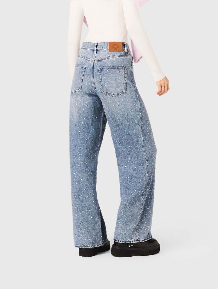 Jeans larghi con strass all-over