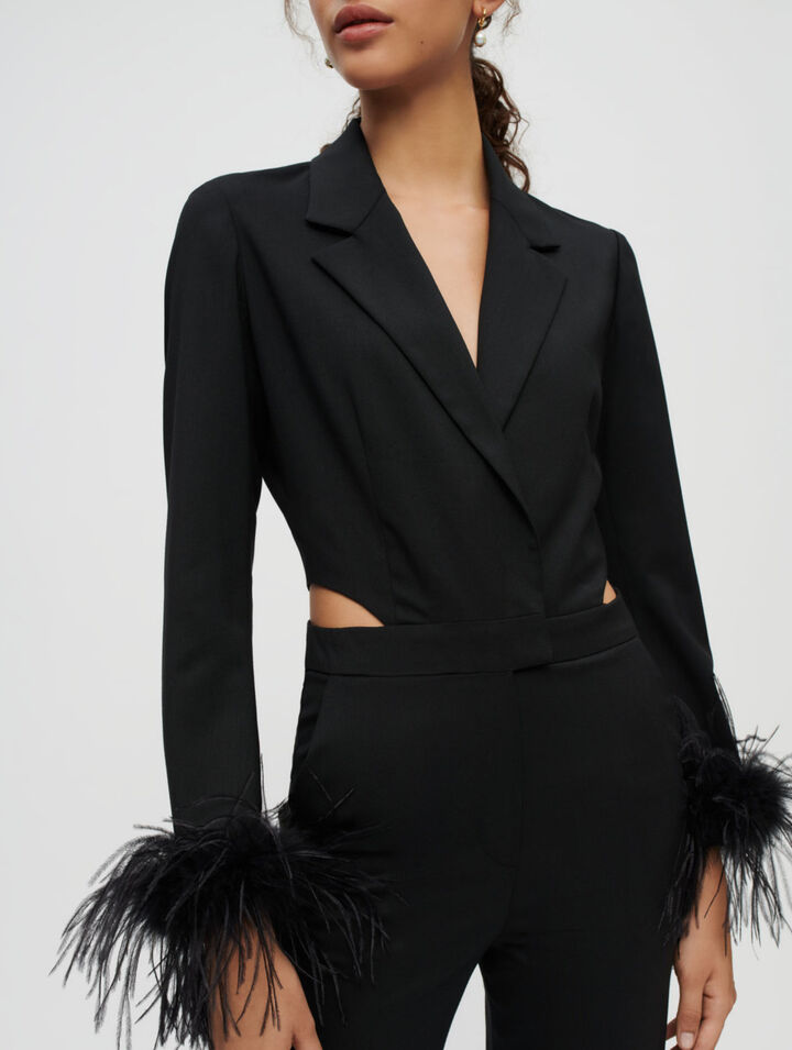 Tuta pantalone in piume nere