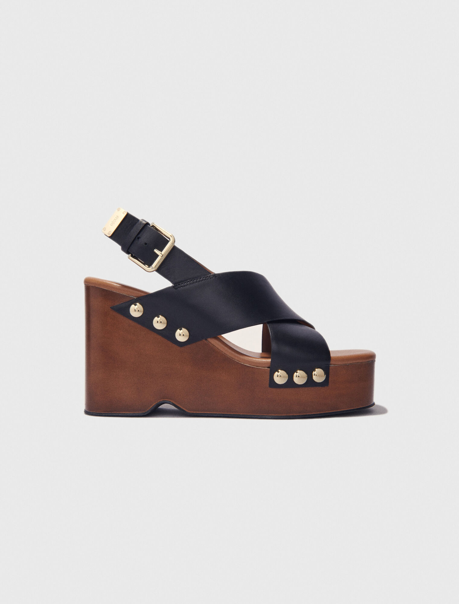 Sandali con zeppa in pelle