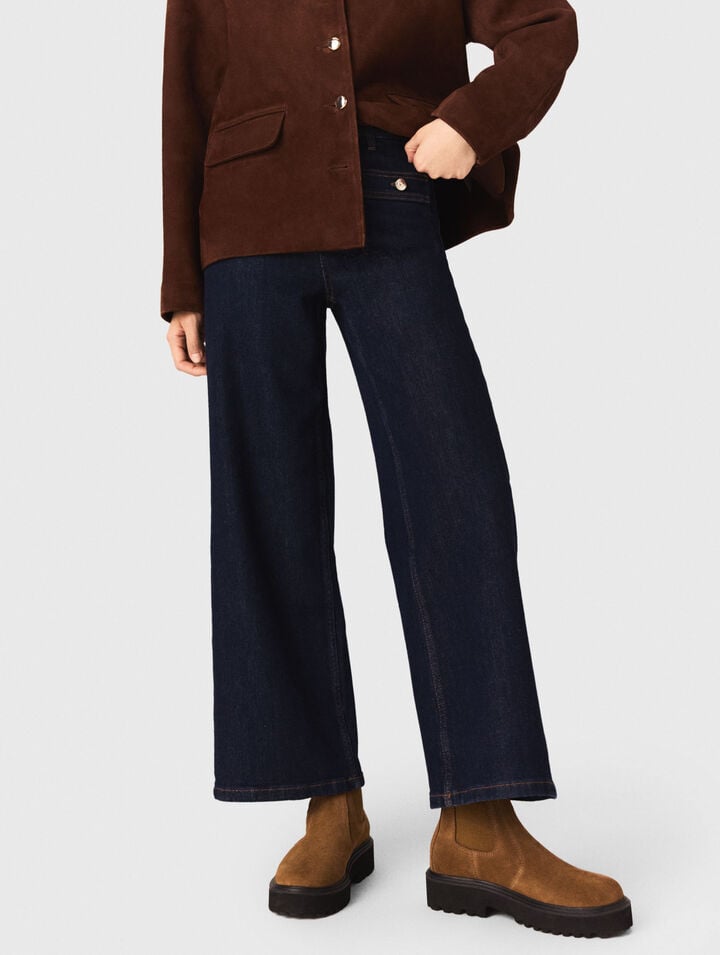 Jeans larghi con tasche applicate