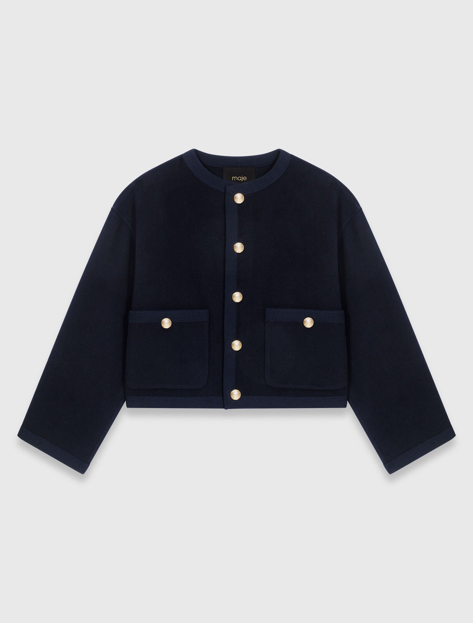 Giacca double face, bordi a treccia