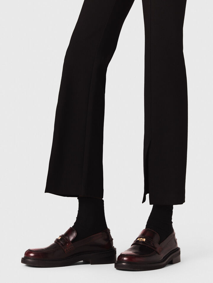 Pantaloni con spacco