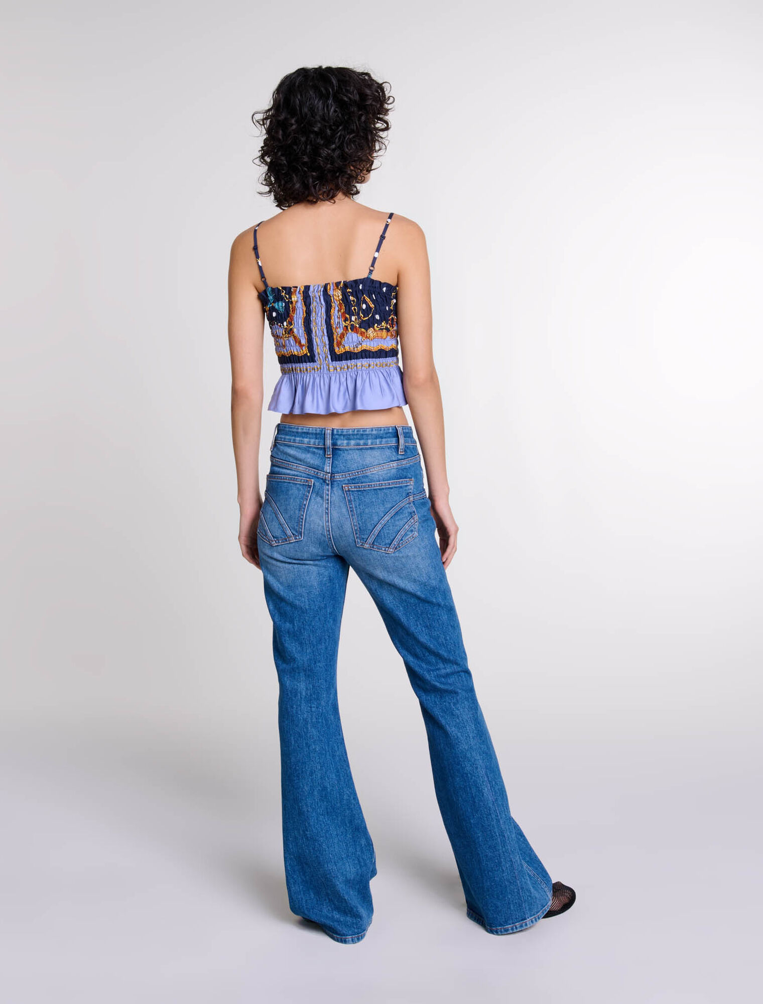 Jeans flare con tasche ricamate