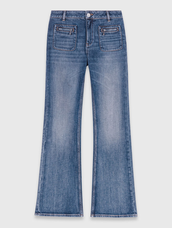 Jeans bootcut con tasche con zip