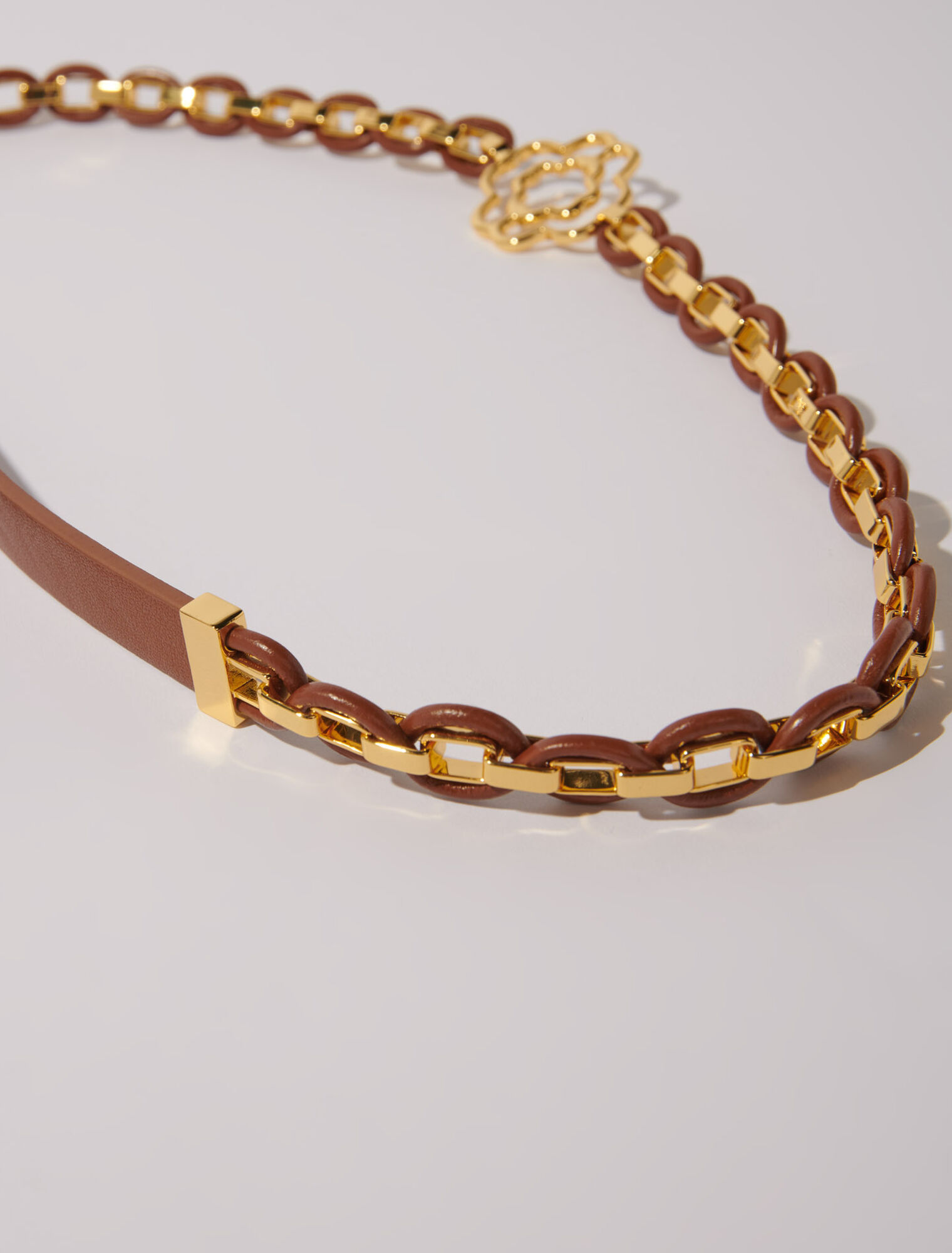 Cintura con maglie in pelle