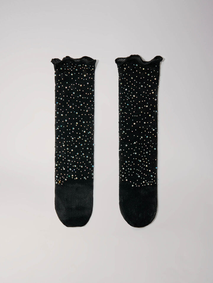 Calze a rete glitterate