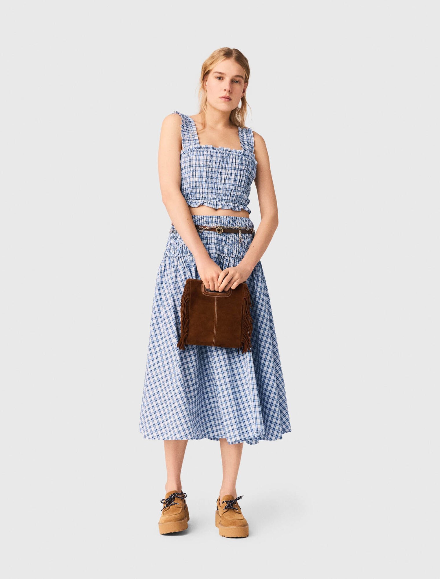 Top punto smock in cotone strassato