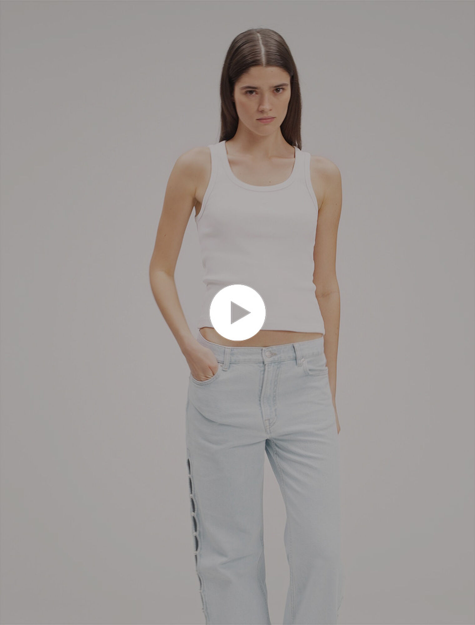 Jeans larghi con cut-out e strass