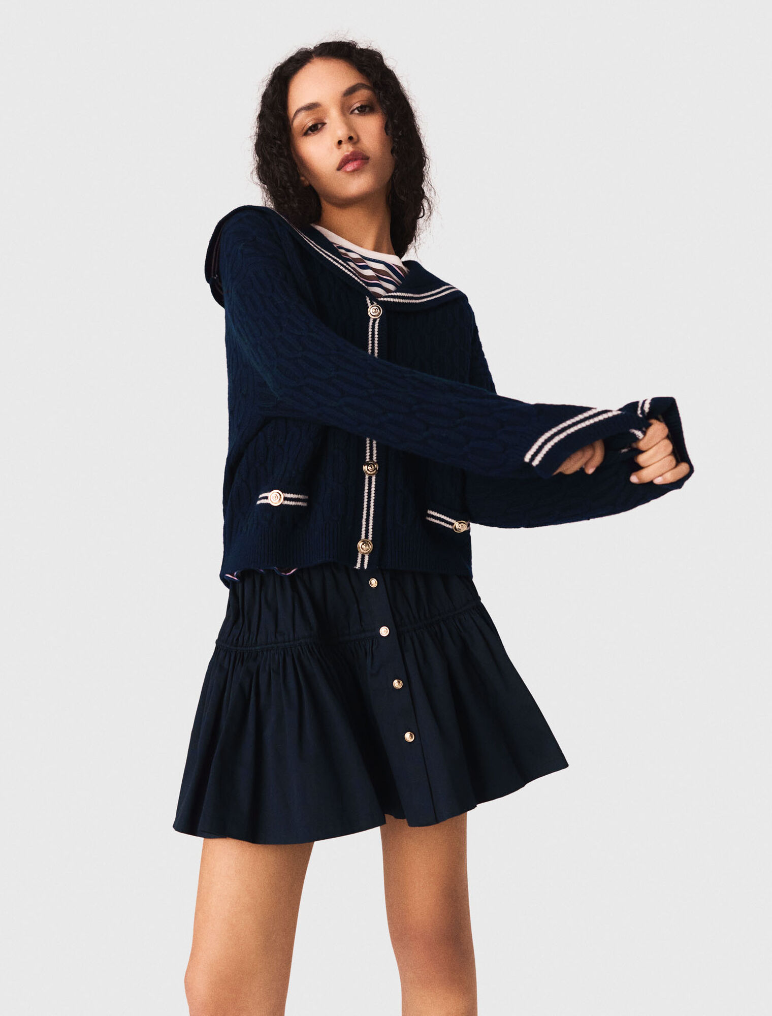 Cardigan a trecce con scollo barca