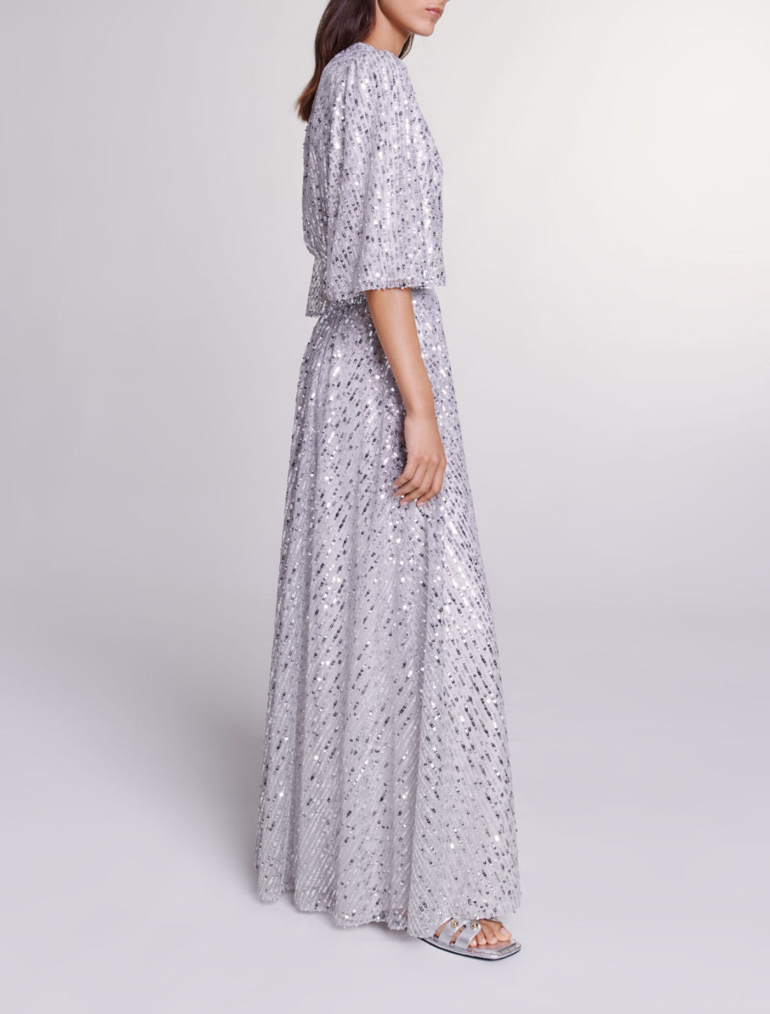 Abito lungo con lustrini