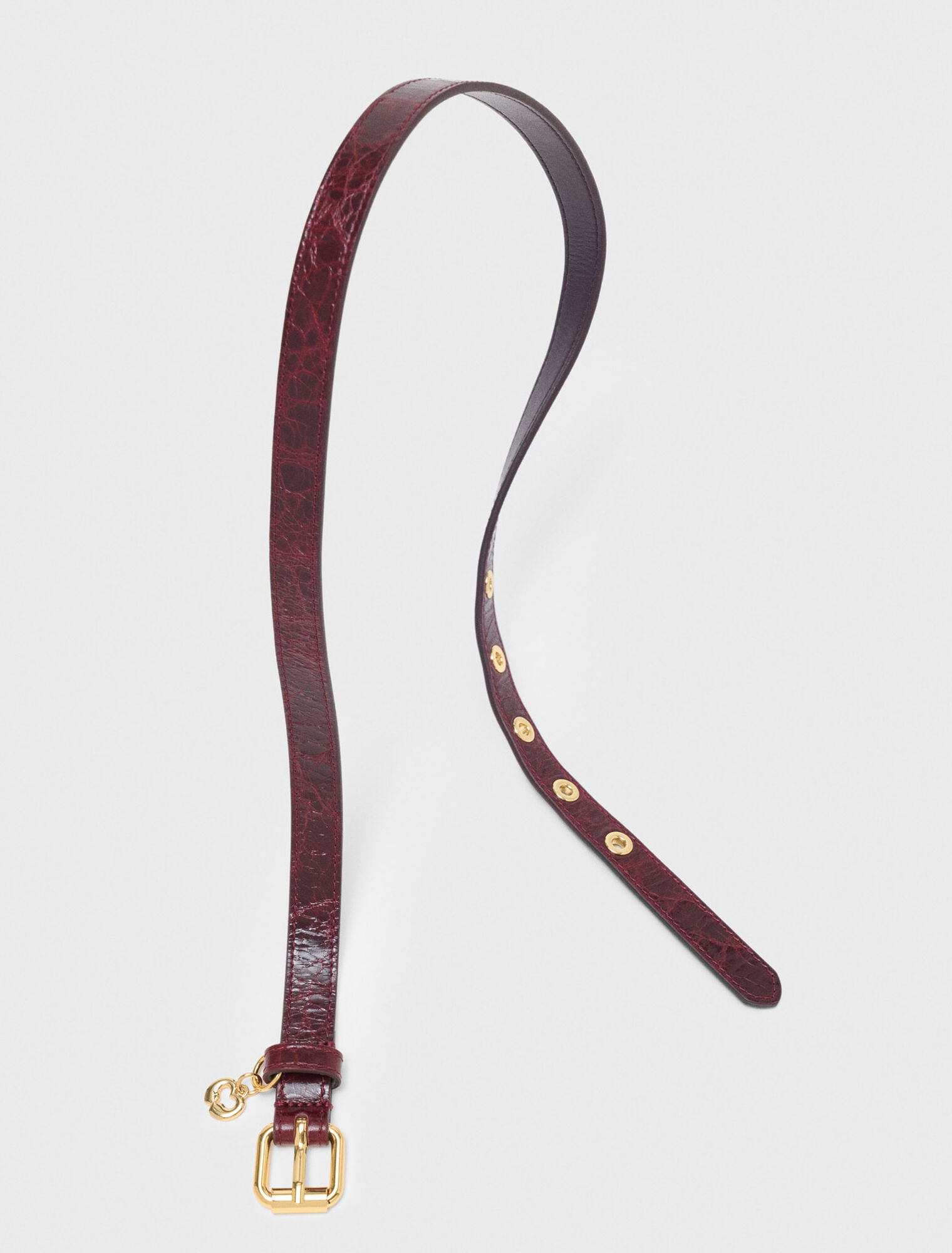 Cintura fine in pelle con occhielli