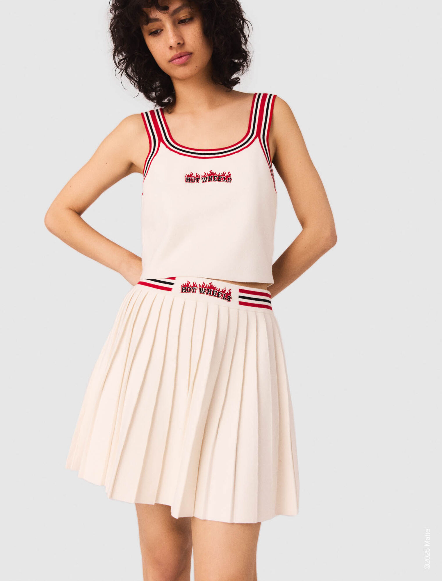 Gonna corta plissettata in maglia