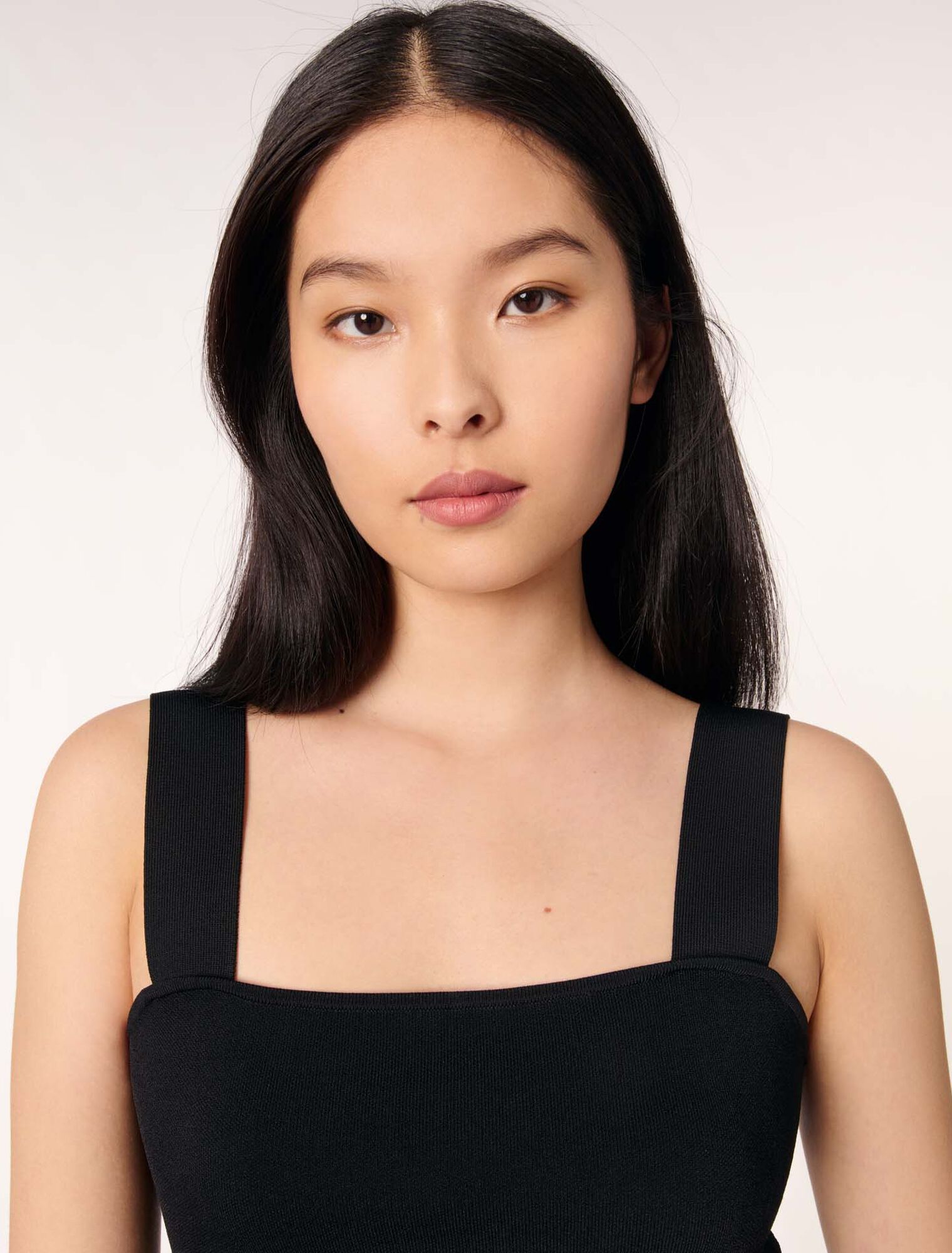 Top crop in maglia con spalline