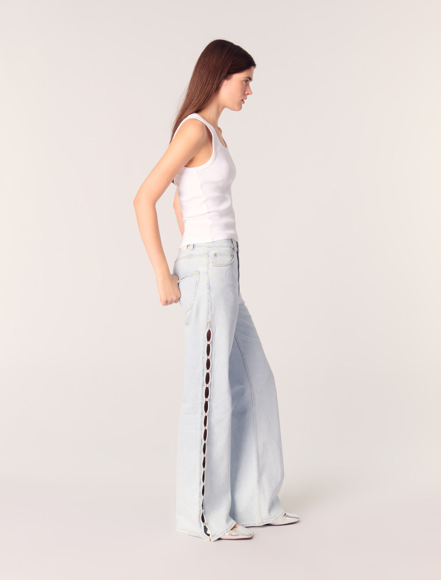 Jeans larghi con cut-out e strass