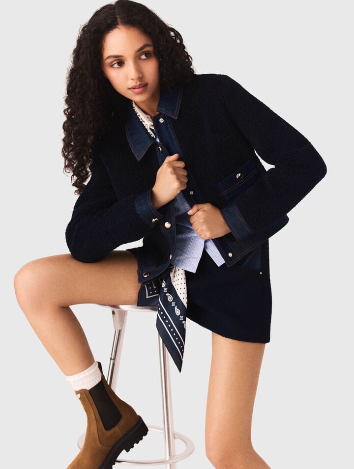 Giubbotto boucl&eacute; e dettagli denim