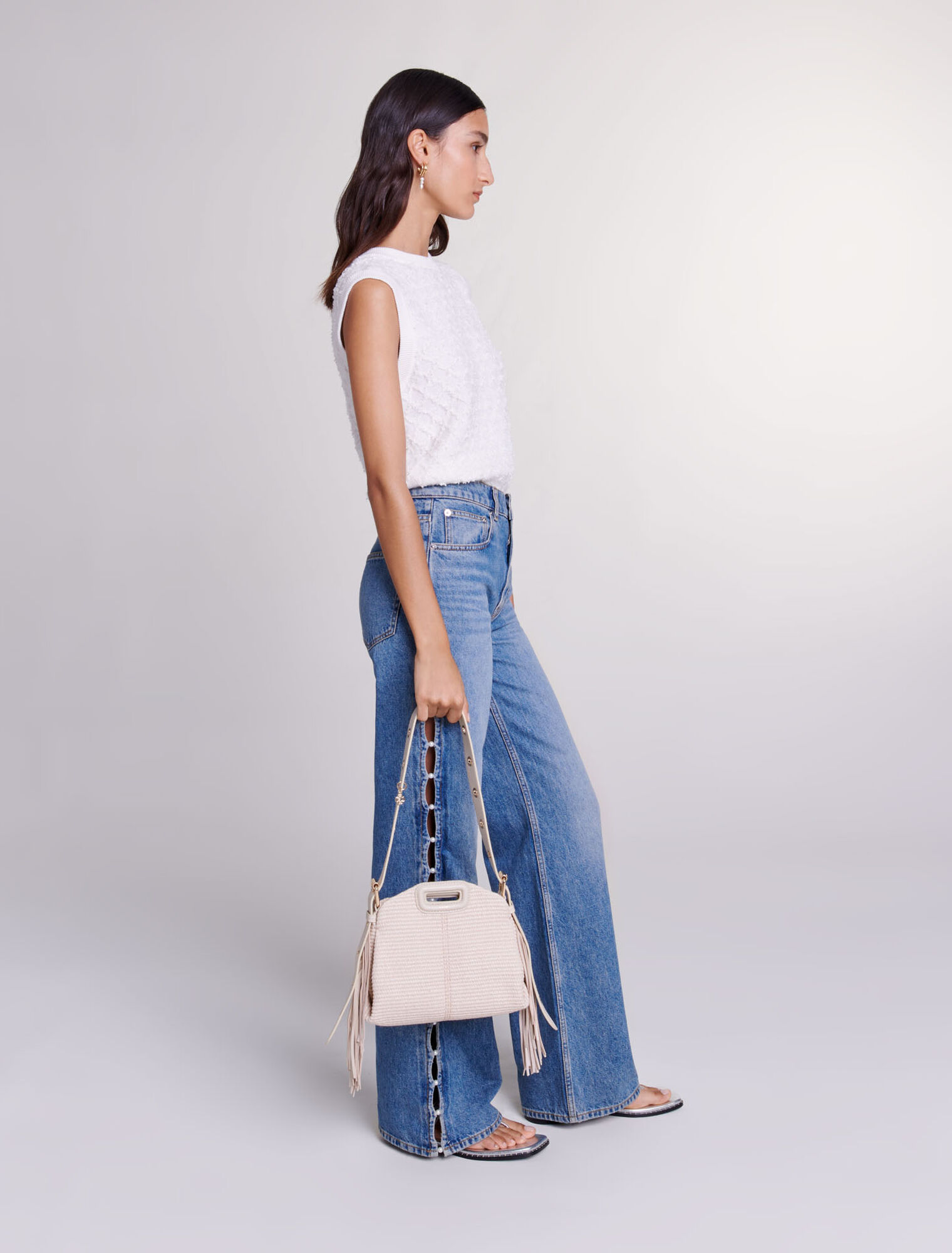 Jeans dritti traforati con perline