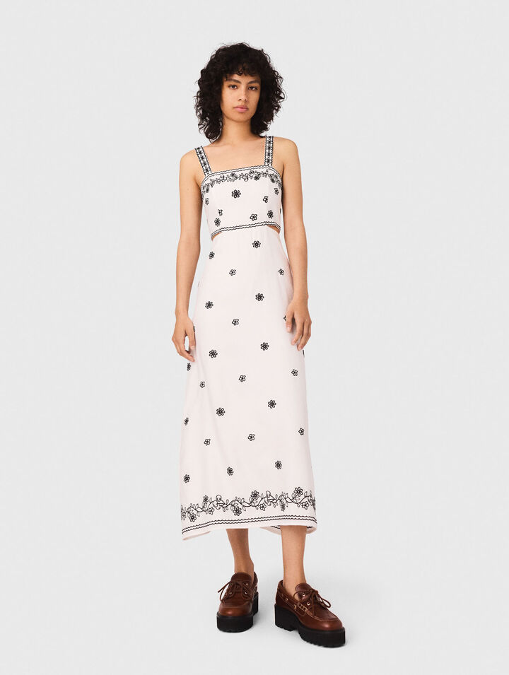 Abito lungo ricamato con cut-out