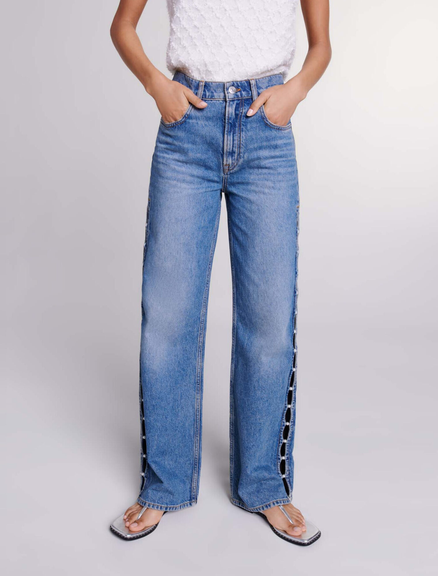 Jeans dritti traforati con perline