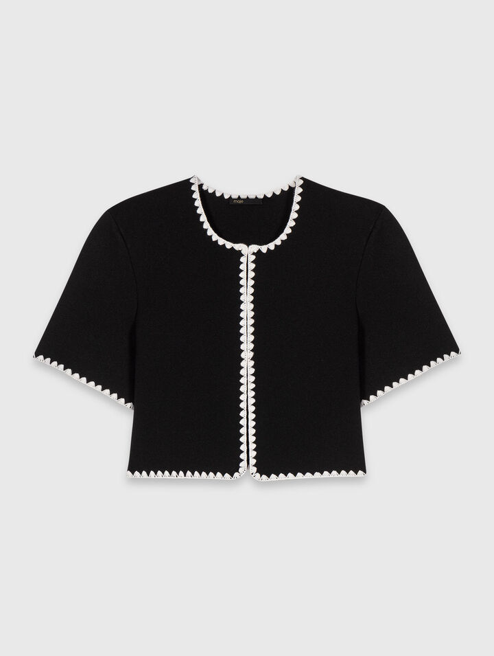 Cardigan corto con impunture