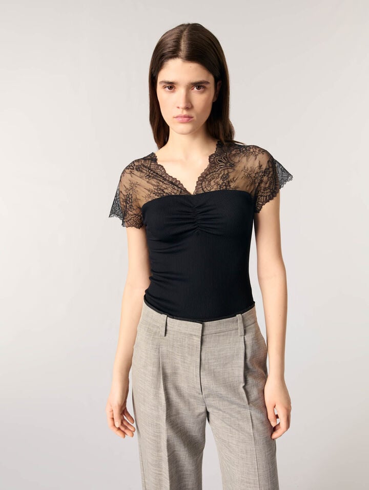 Top in jersey con applicazioni in pizzo