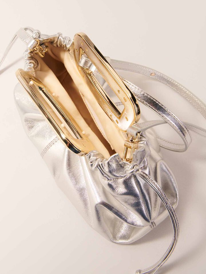 Clutch pelle metal manico metallo