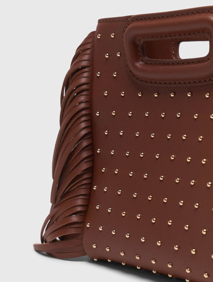 Borsa M mini in pelle e borchie