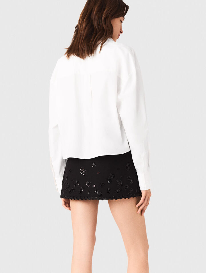 Shorts trompe l'œil ricamati