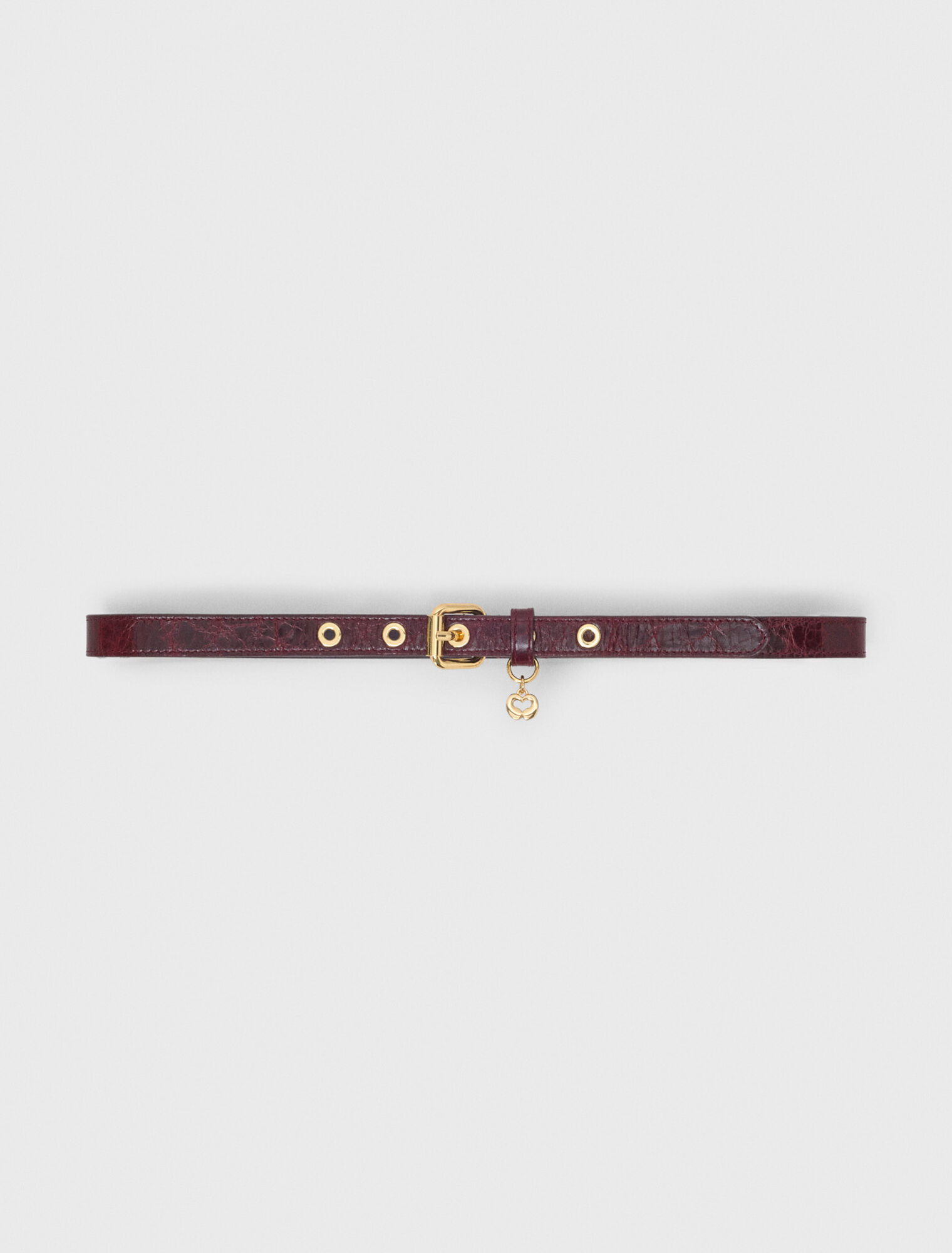 Cintura fine in pelle con occhielli