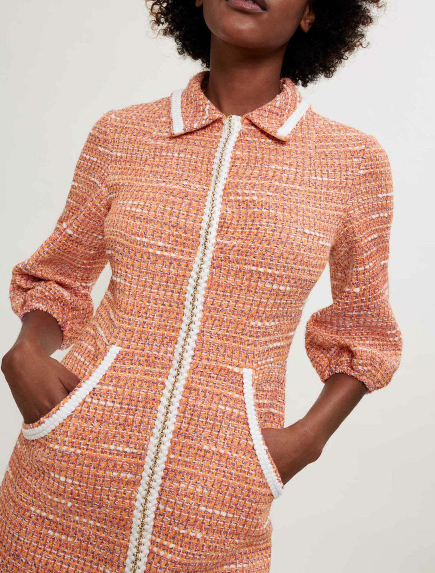 Abito in tweed con trecce