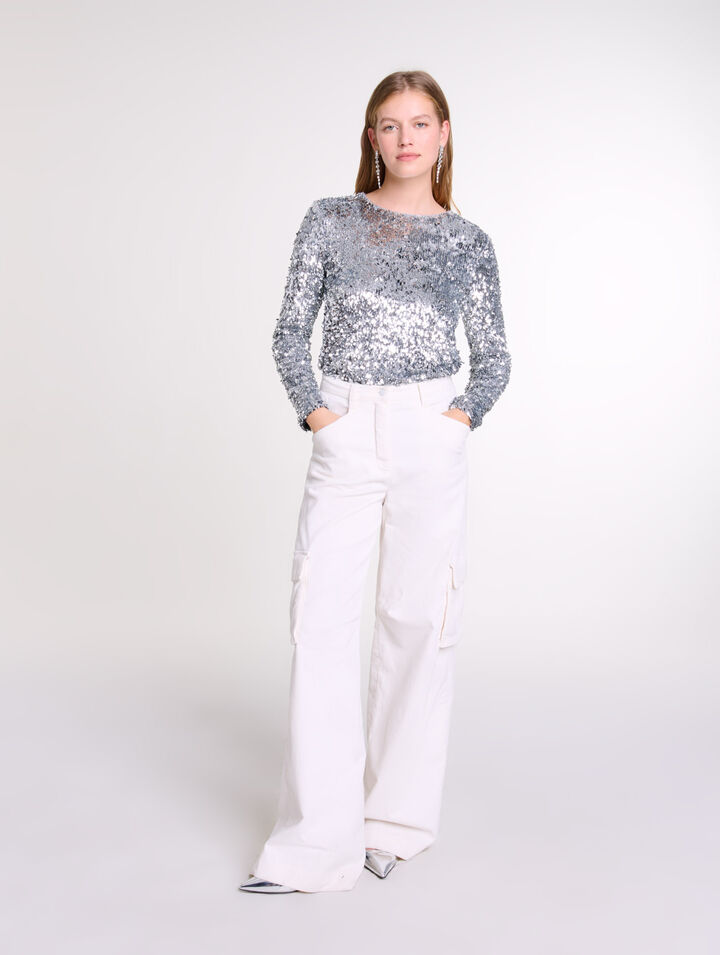 Top a maniche lunghe e paillettes 