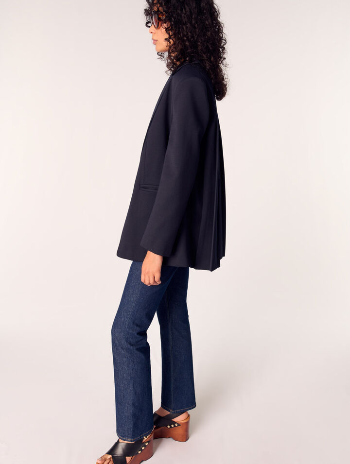 Jeans in denim con tasche