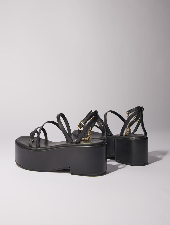 Sandali con zeppa in pelle