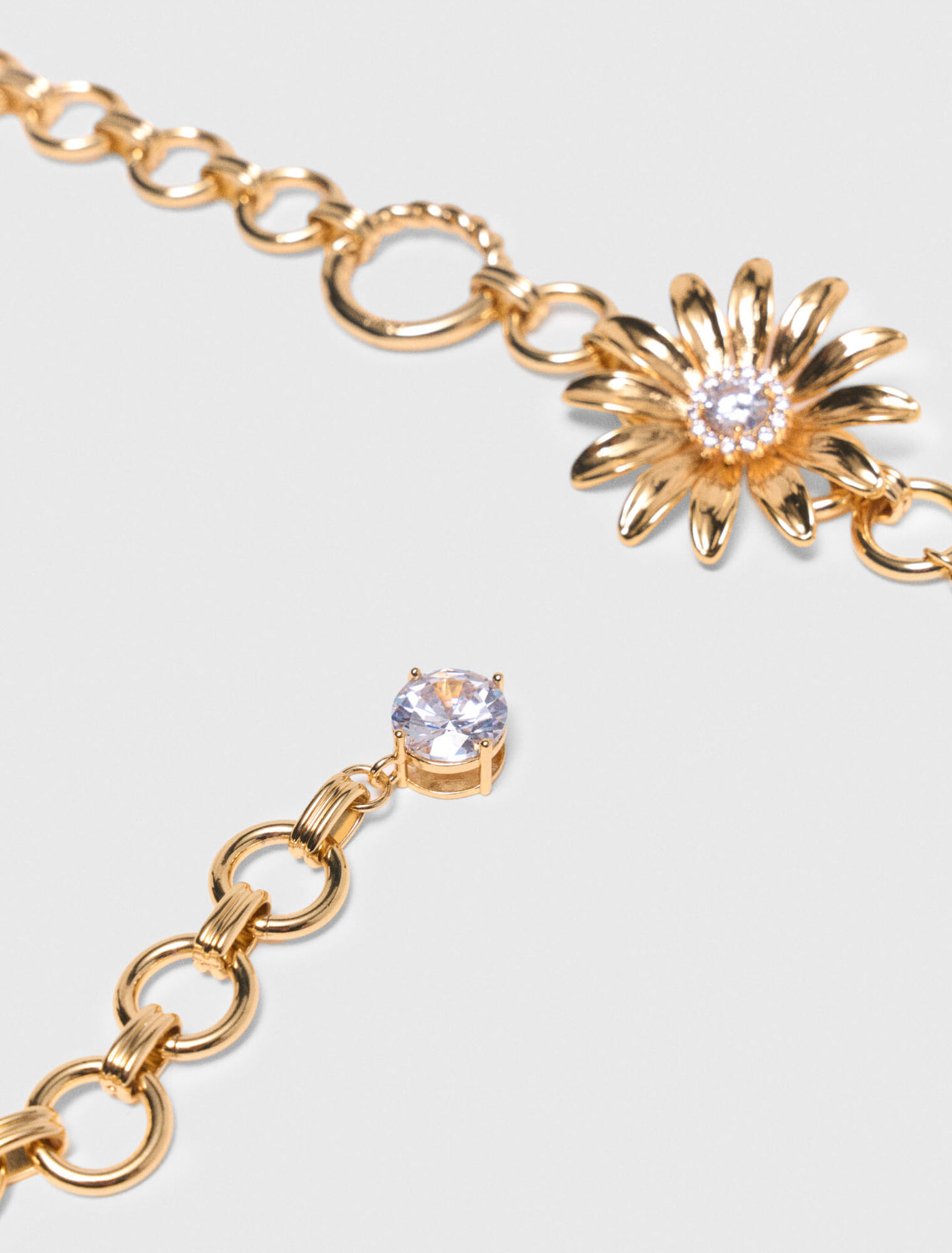 Cintura a catena con fiori