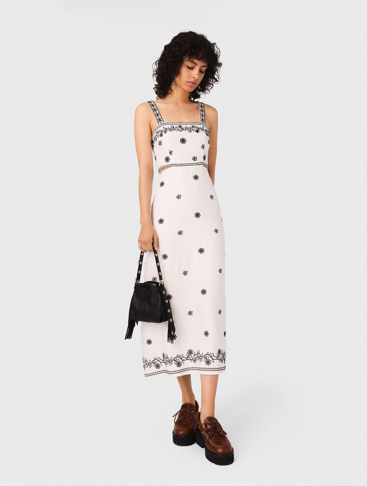 Abito lungo ricamato con cut-out