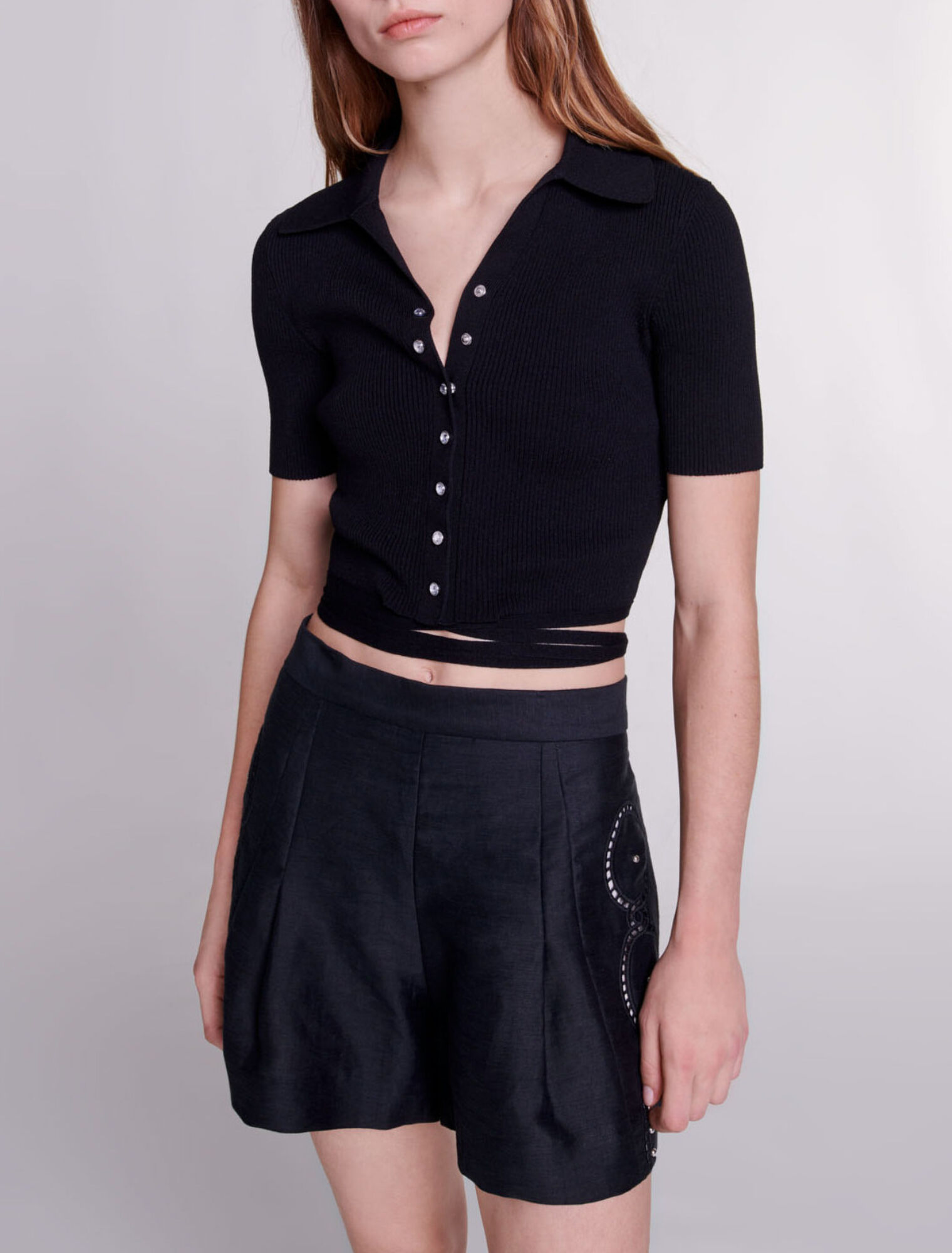 Shorts lino traforato con rivetti