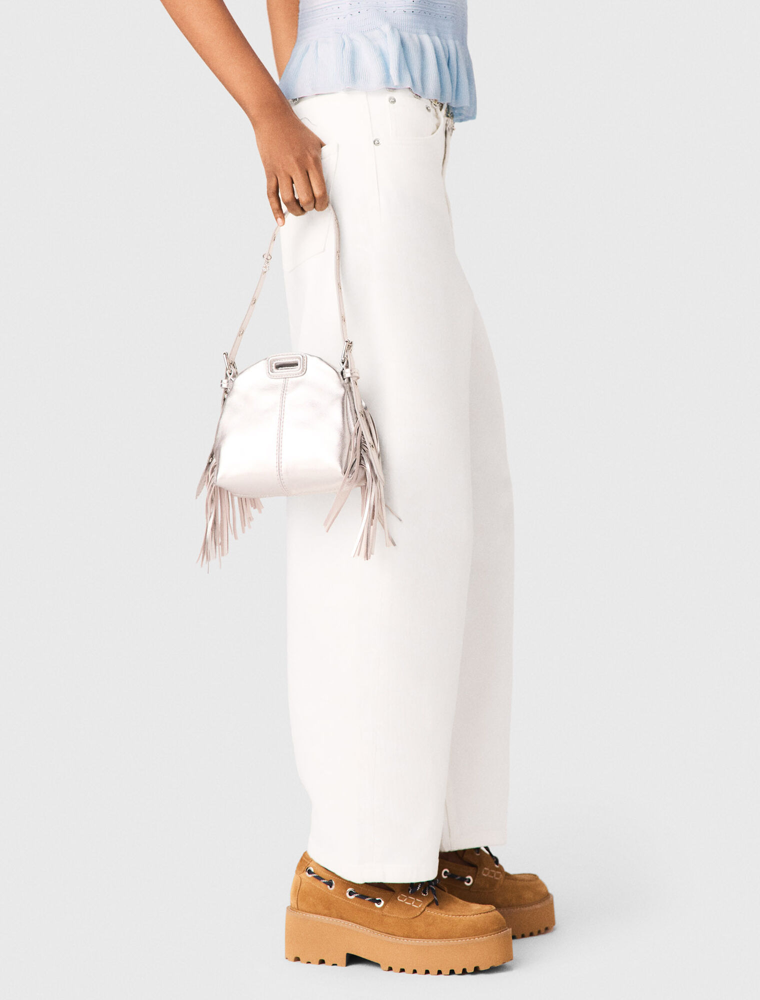 Top in maglia con volant