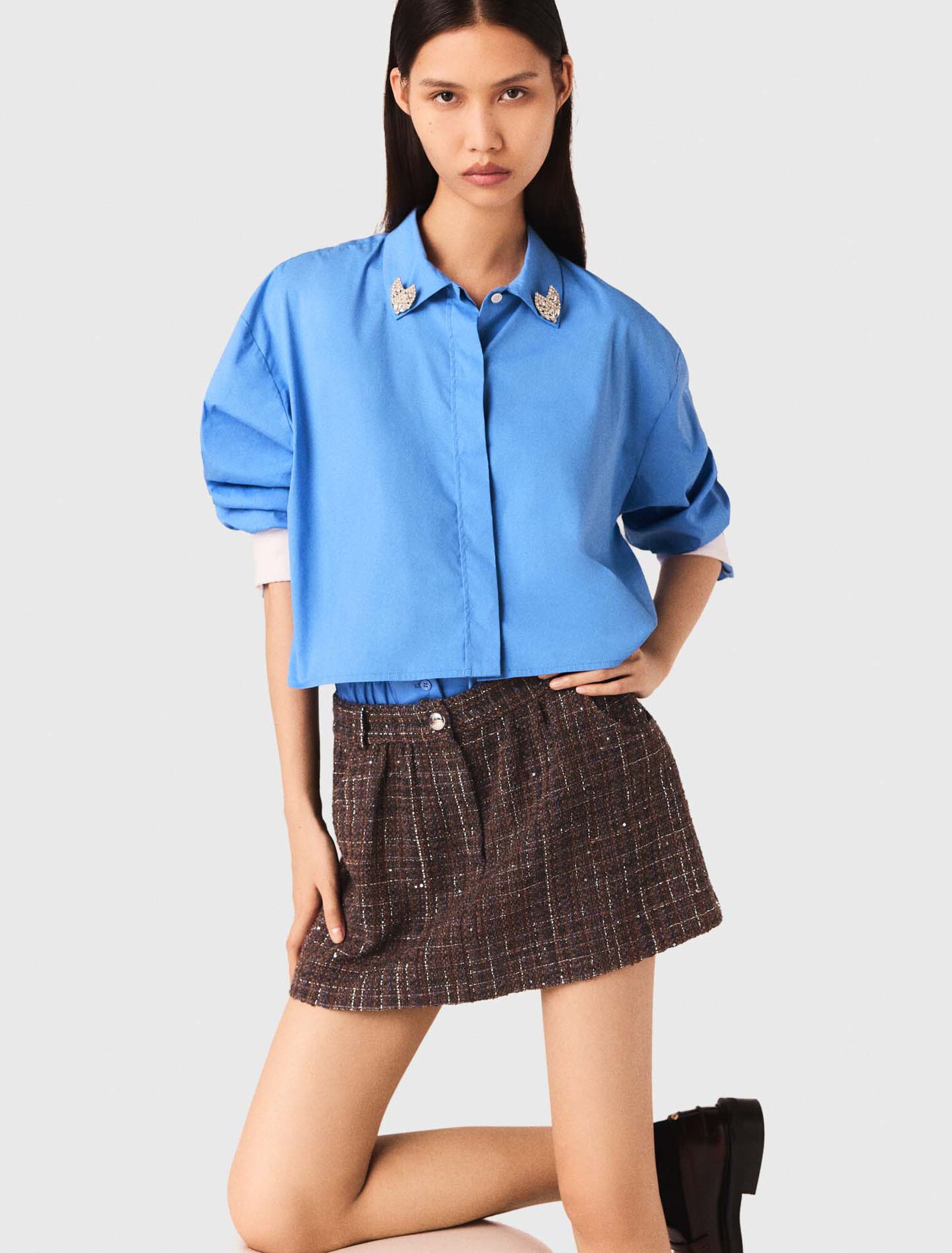 Shorts in tweed con fascia elastica