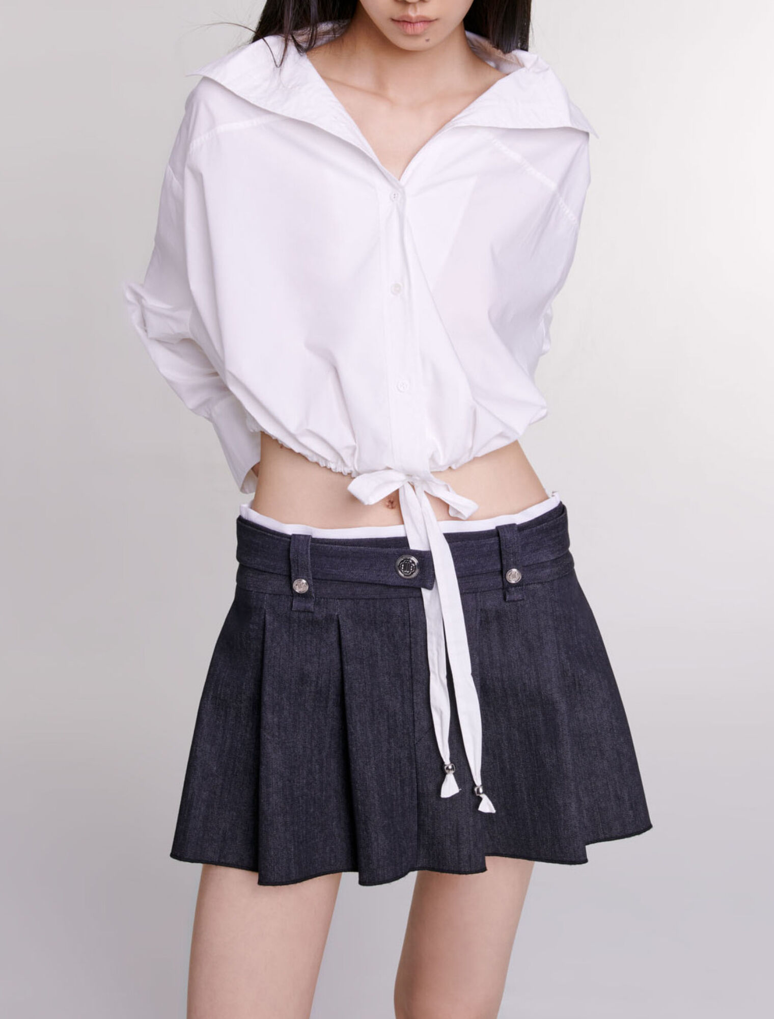 Minigonna nera effetto jeans
