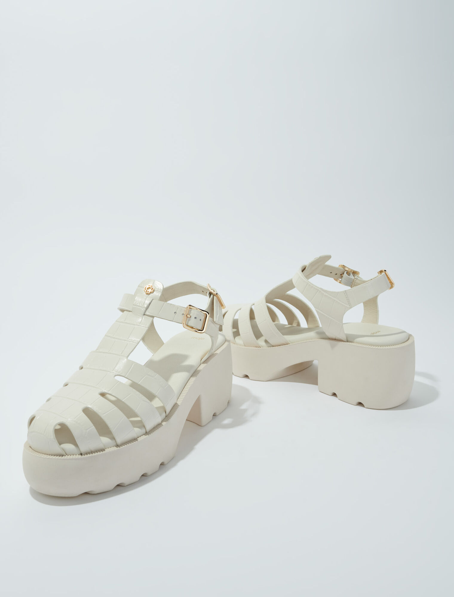 Sandali dentellati in pelle