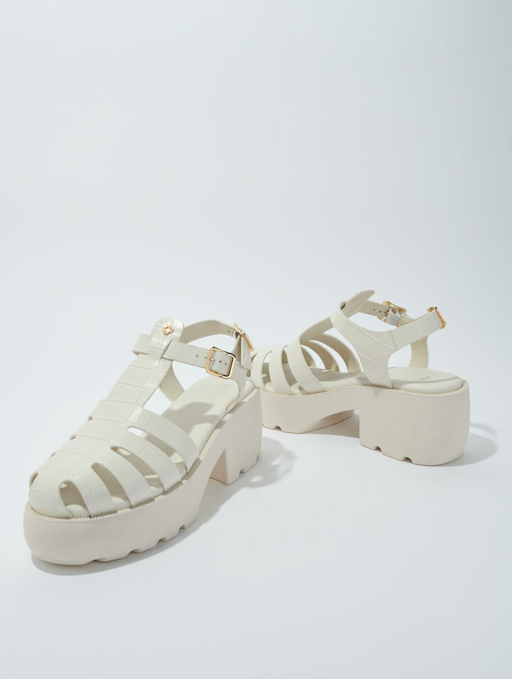 Sandali dentellati in pelle