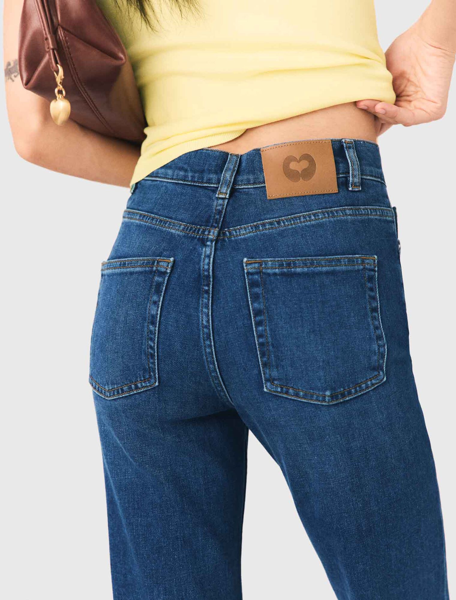 Jeans bootcut con perle