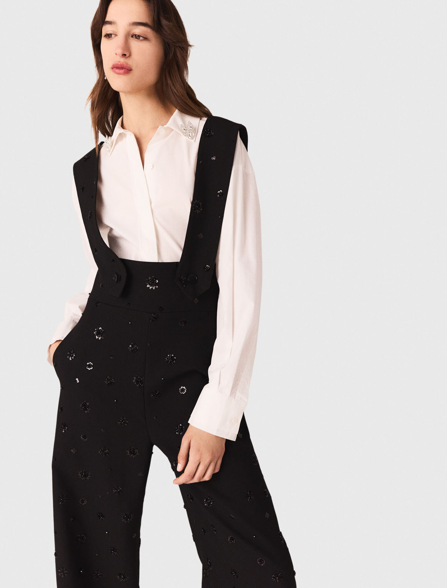 Pantaloni ricamati con bretelle