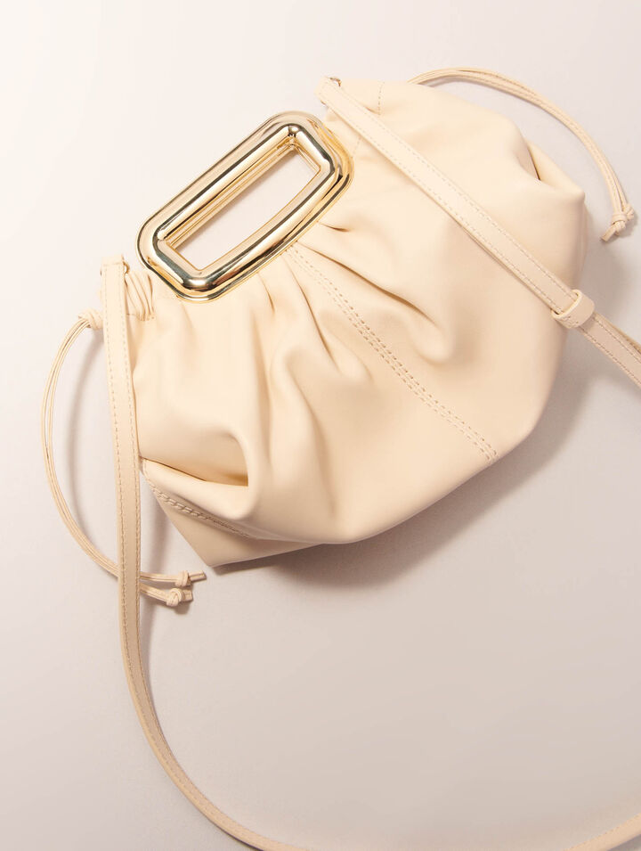Clutch in pelle manico in metallo
