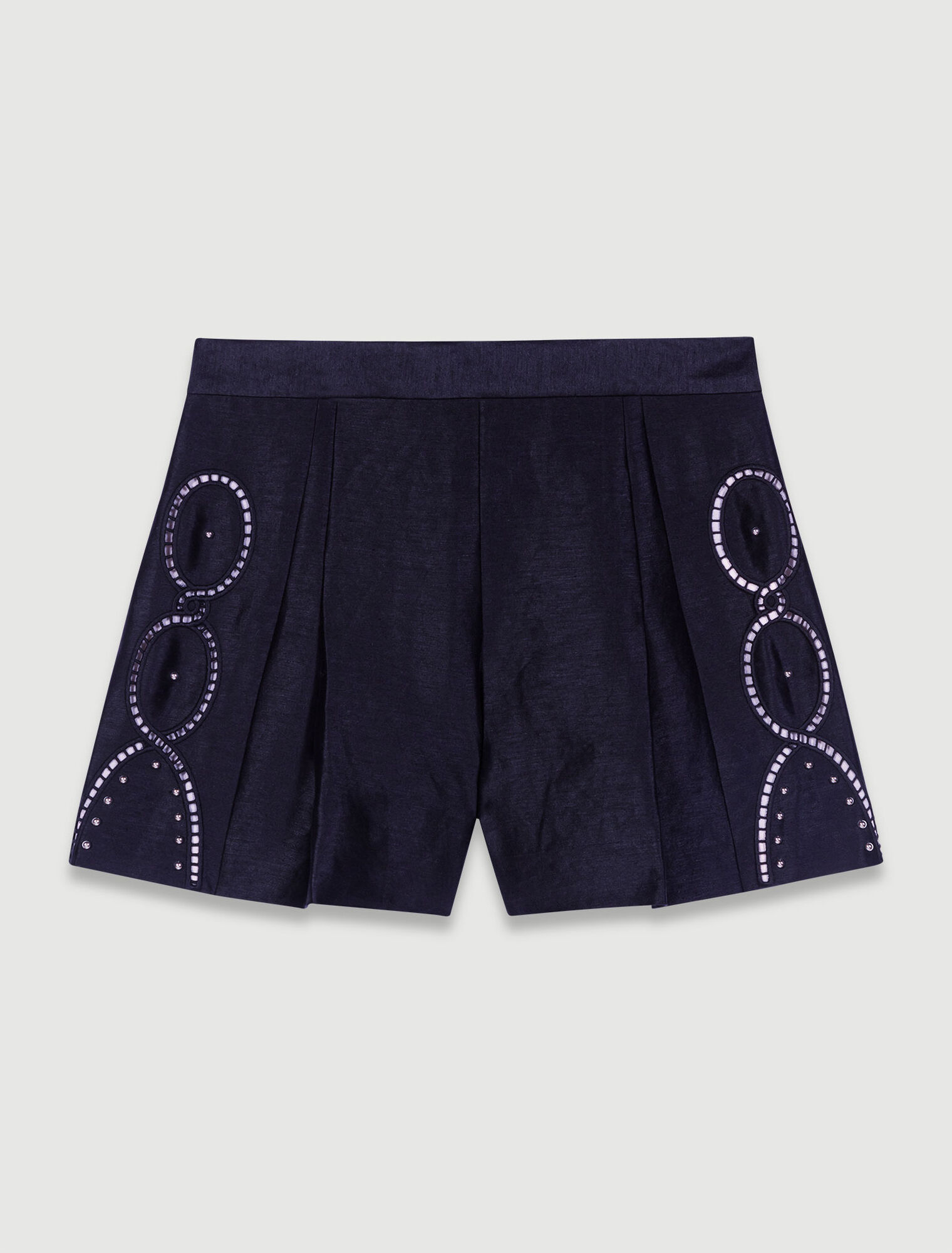 Shorts lino traforato con rivetti