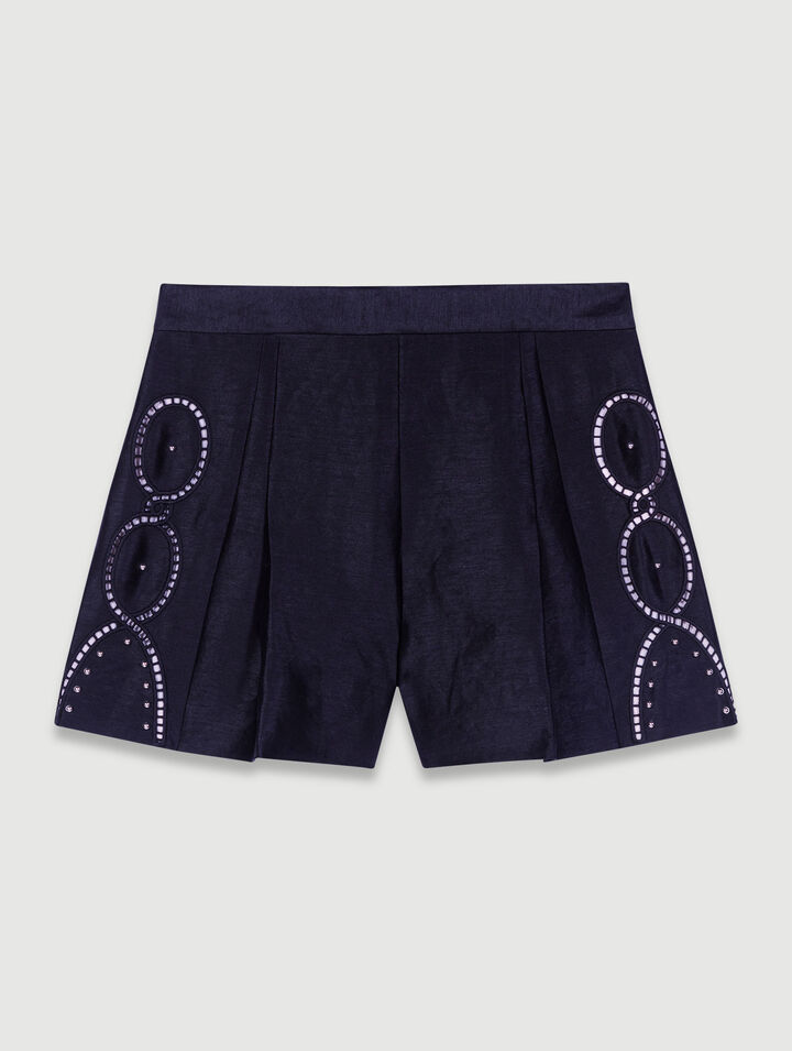 Shorts lino traforato con rivetti