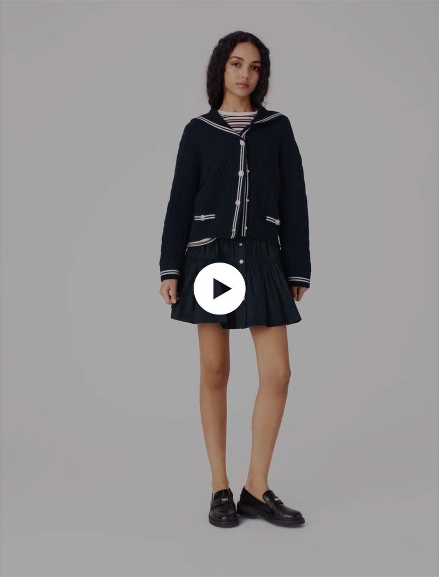 Cardigan a trecce con scollo barca