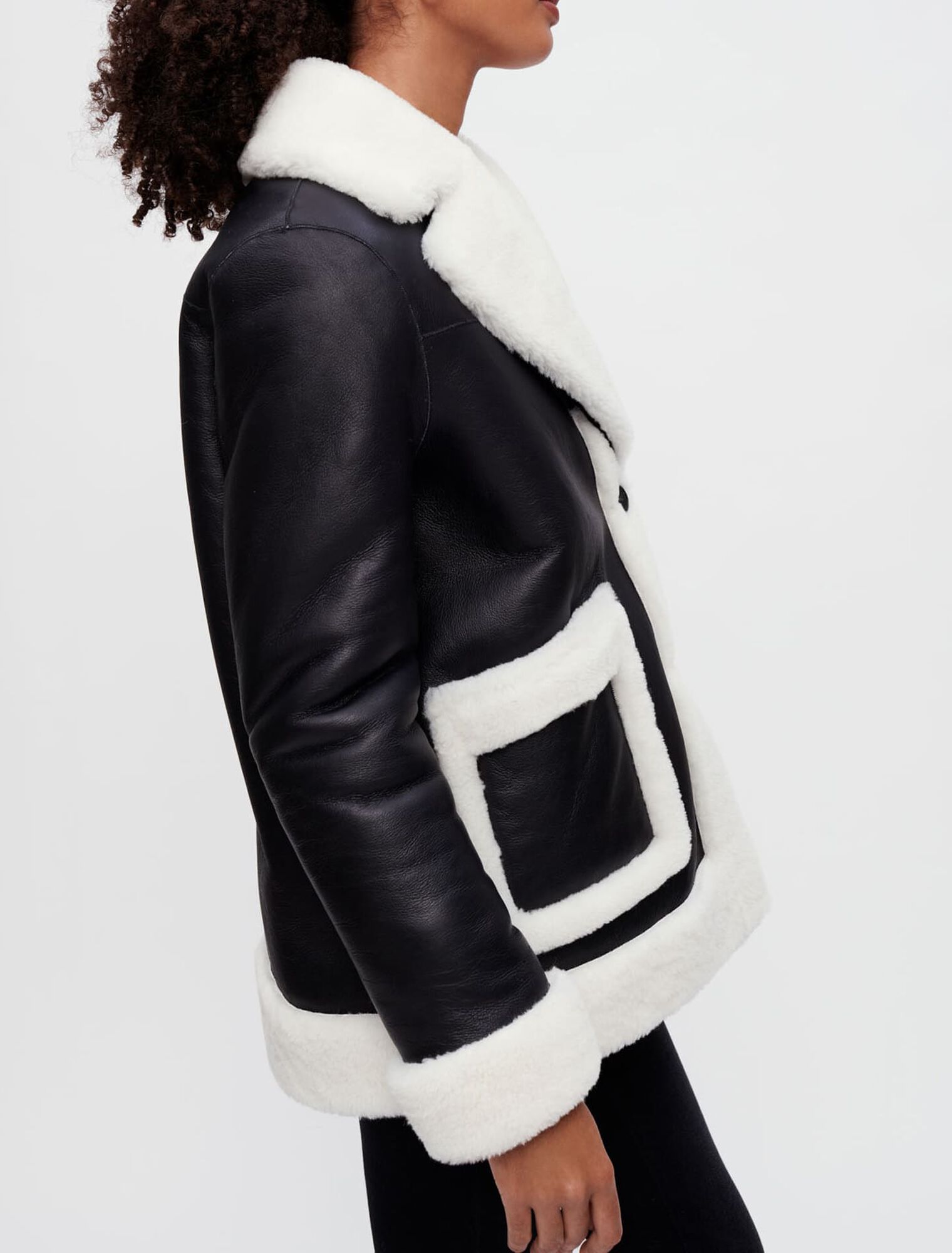 Cappotto in shearling bicolore