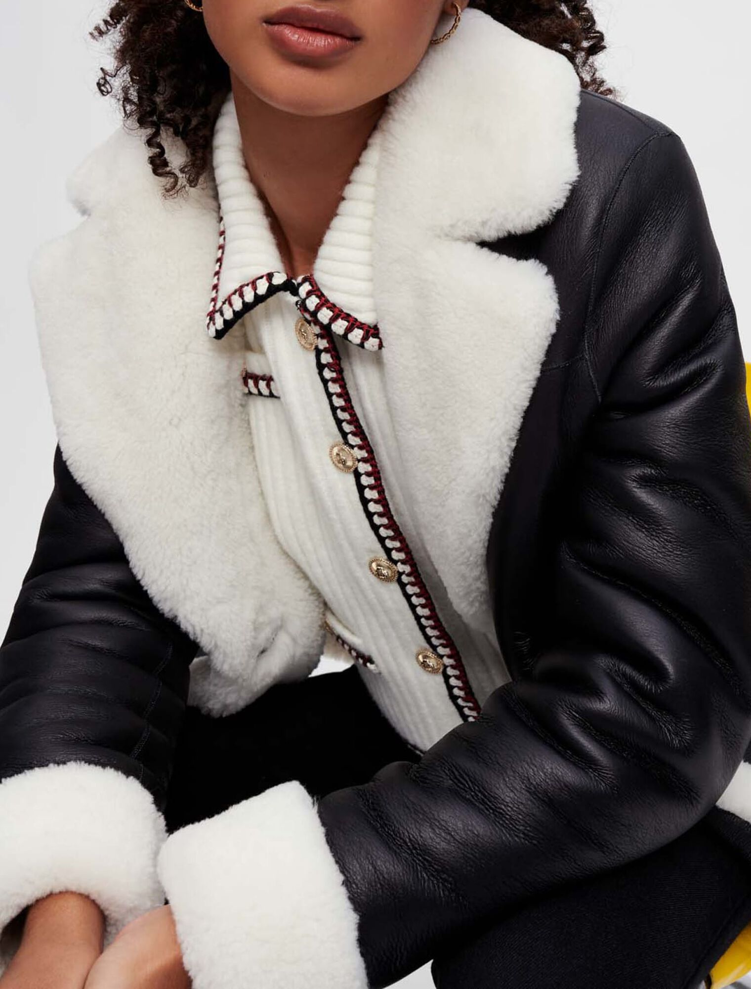 Cappotto in shearling bicolore