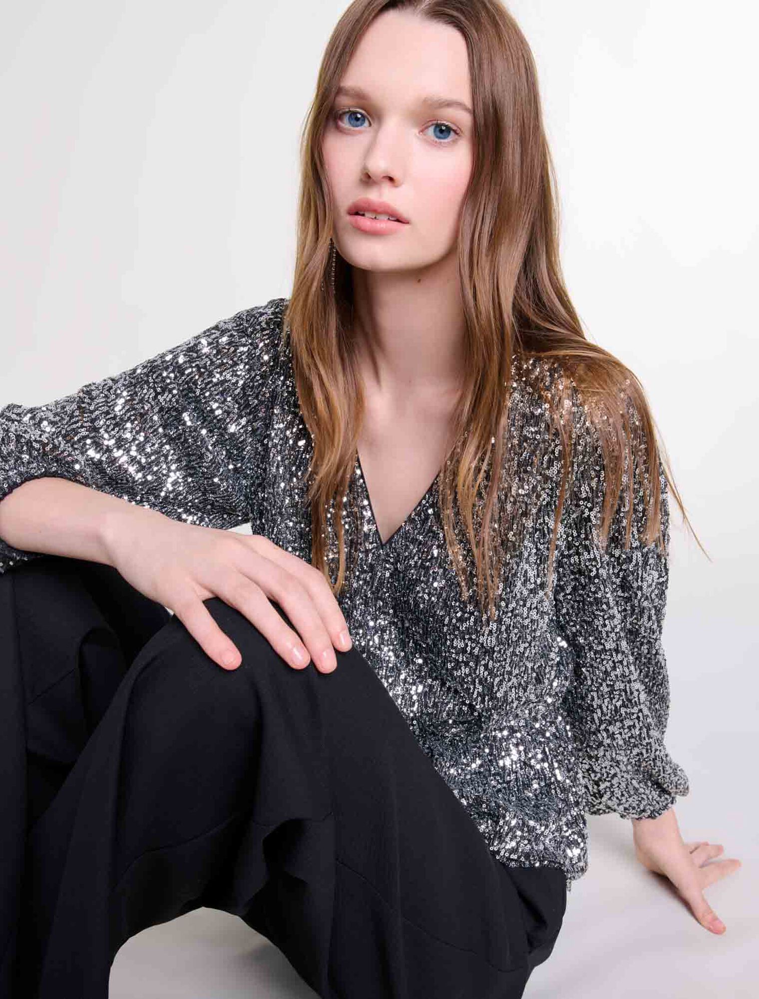 Top a punto smock con lustrini